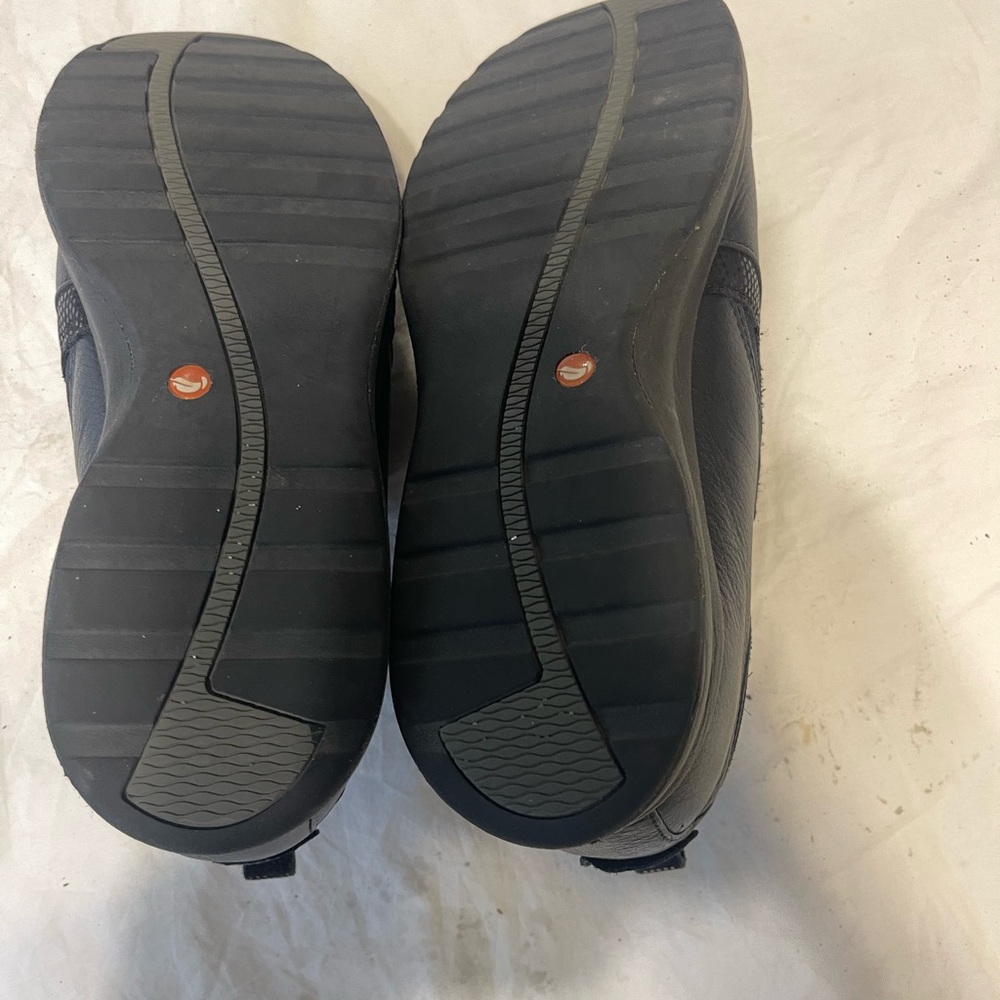 Clarks Women's Un Adorn Zip shoes.